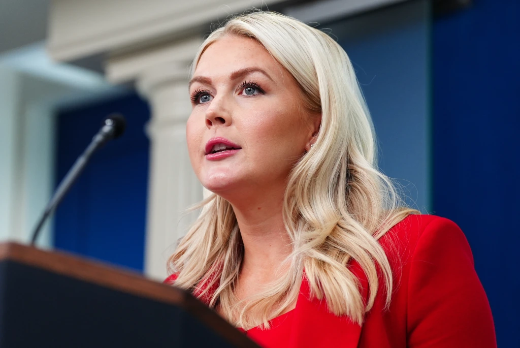 Karoline Leavitt at the White House briefing room podium